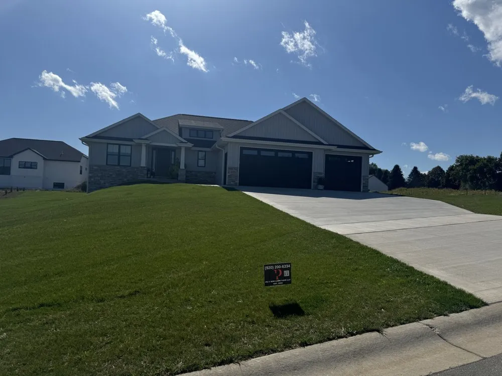 Custom lawn mowing service with custom design in Ashwaubenon, WI by PK & Son Lawn Care