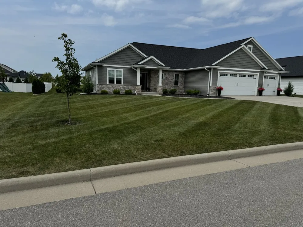 Professional outdoor landscaping for beautiful yards in Ashwaubenon, WI by PK & Son Lawn Care