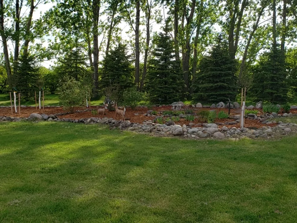 Affordable lawn care service for year-round maintenance in Fargo, ND by Pk Landscaping Service