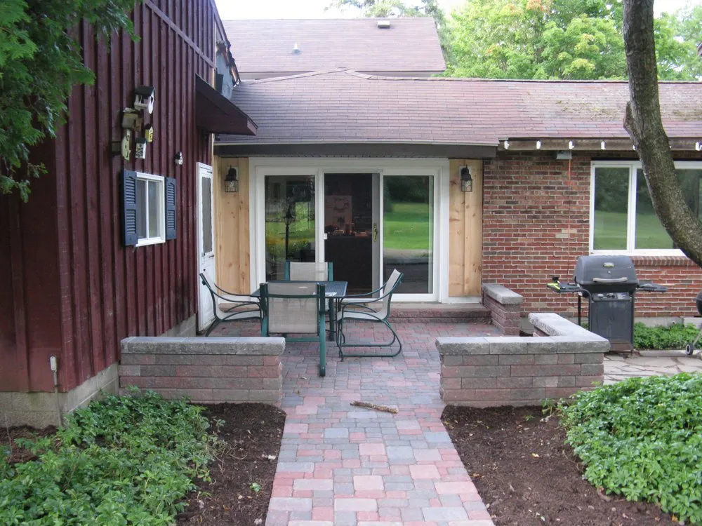 Expert lawn mowing service with custom design across North Tonawanda, NY - PL Services