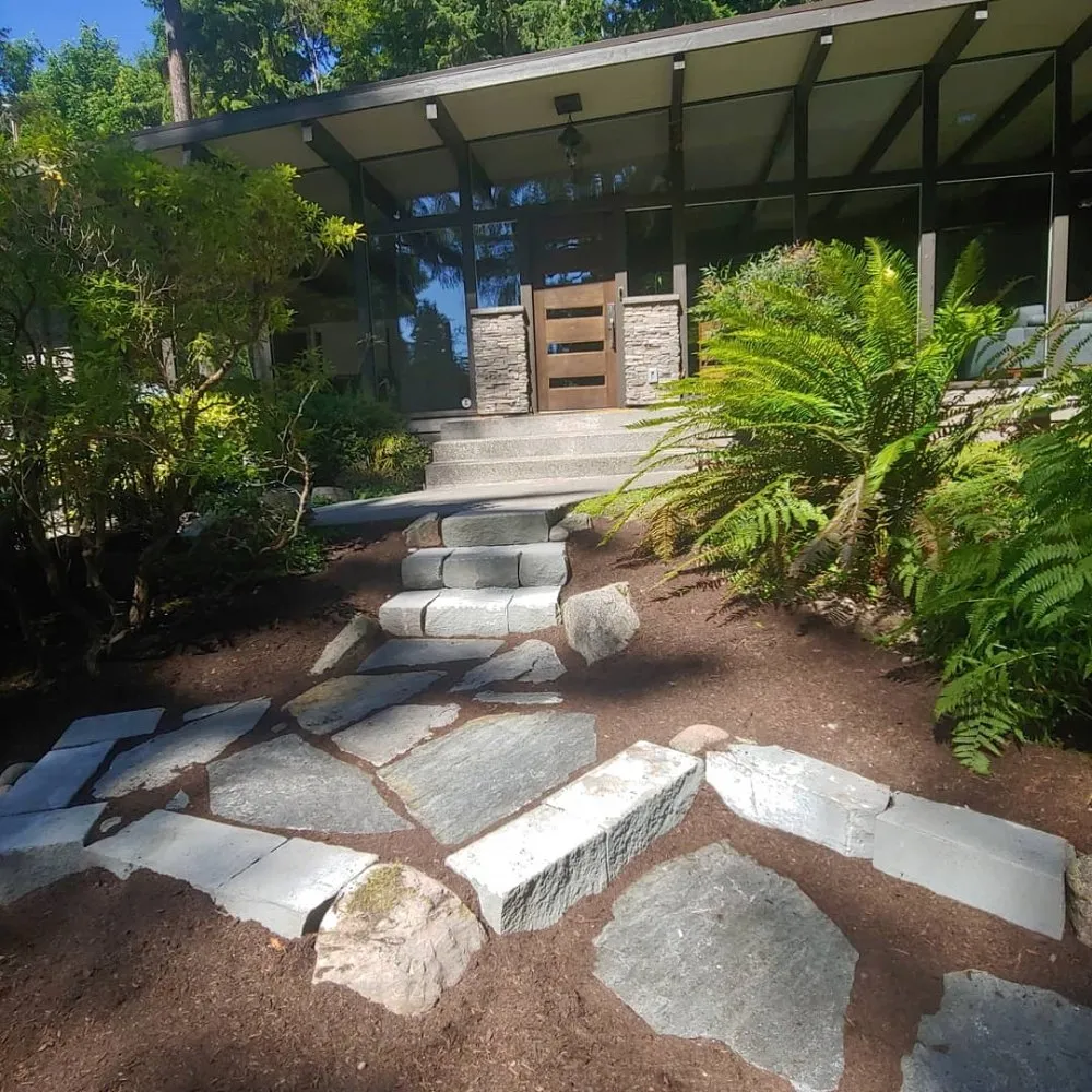 Expert lawn mowing service for year-round maintenance in Shoreline, WA by Plan-It Vision