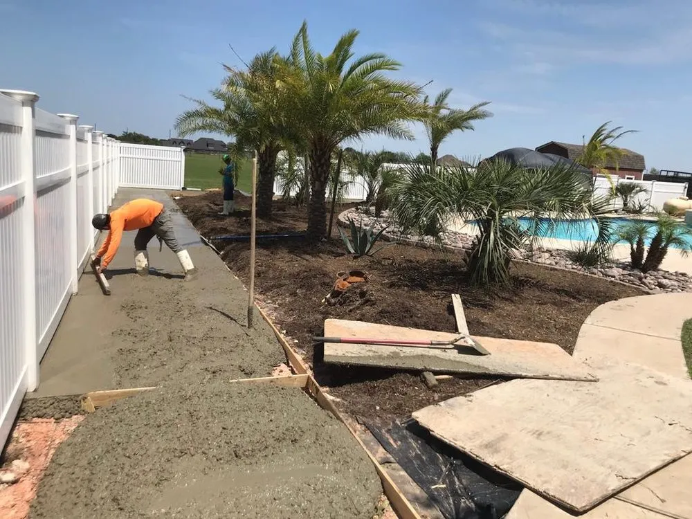 Affordable yard cleanup service for homes in Bellville, TX by Planet Landscape