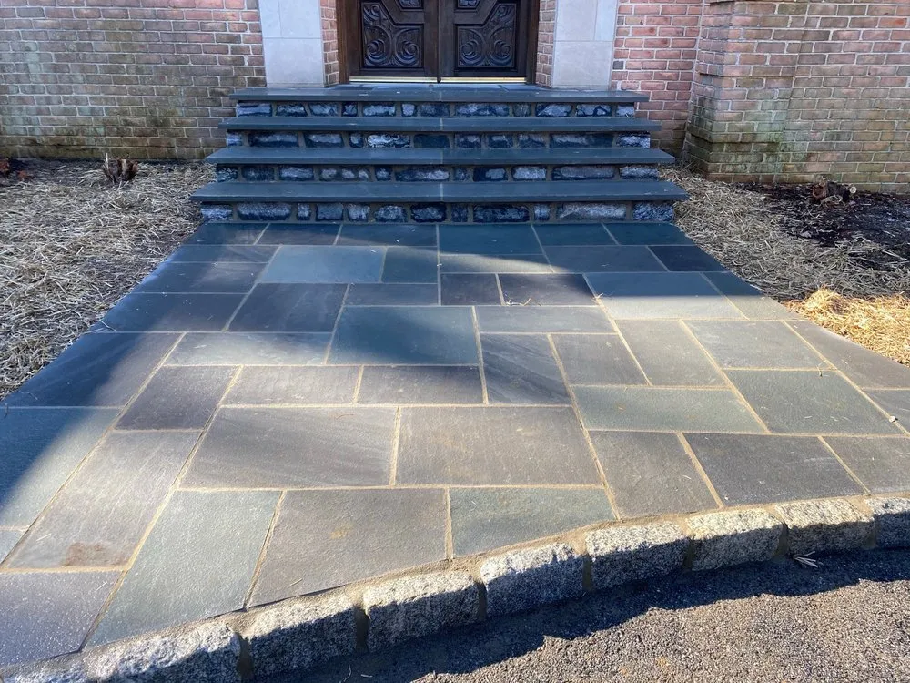 Local yard cleanup service for year-round maintenance in Springfield, PA by Plank Brothers Landscaping