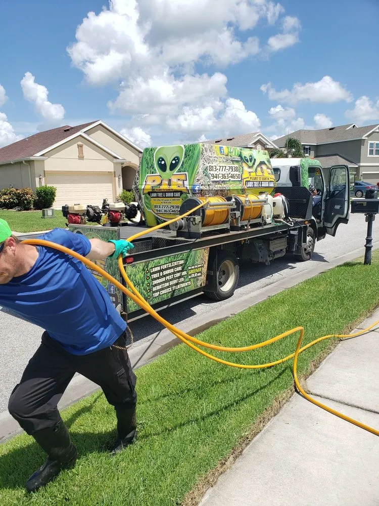 Trusted lawn care service for beautiful yards in Bradenton, FL by Plant It Earth | Bradenton