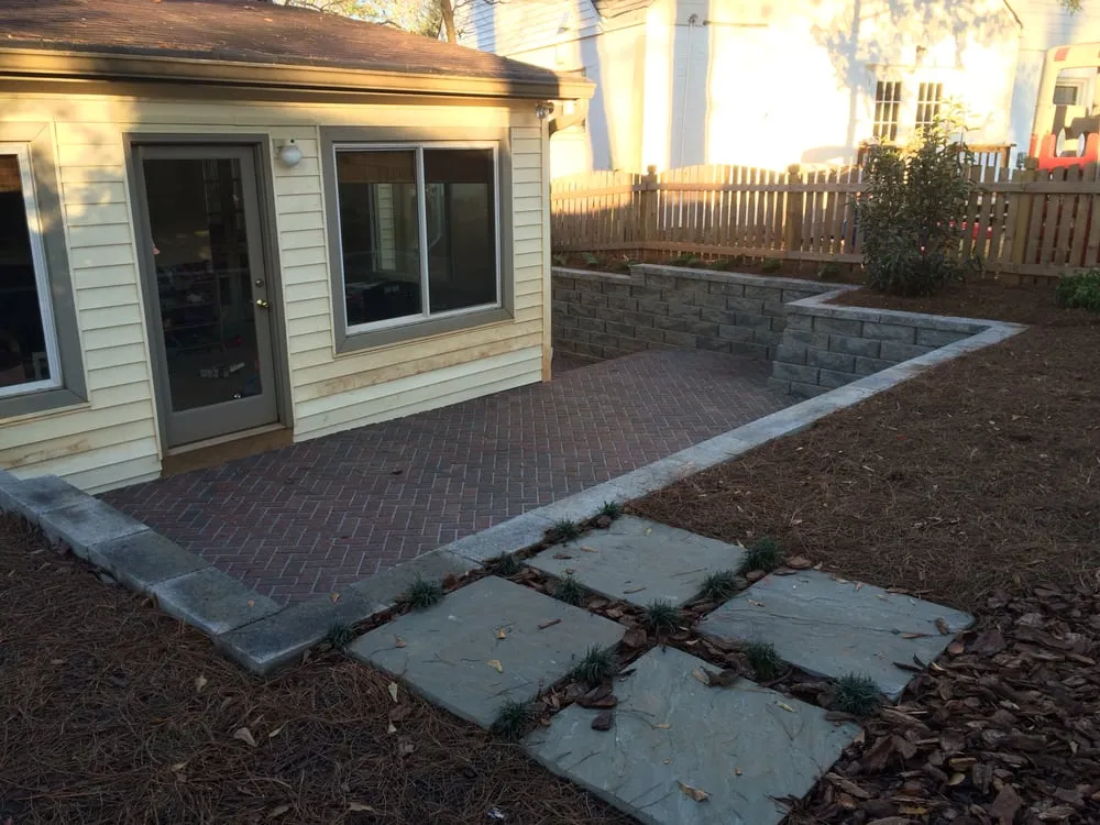 Custom outdoor landscaping in Scottdale, GA by Plants Creative Landscapes