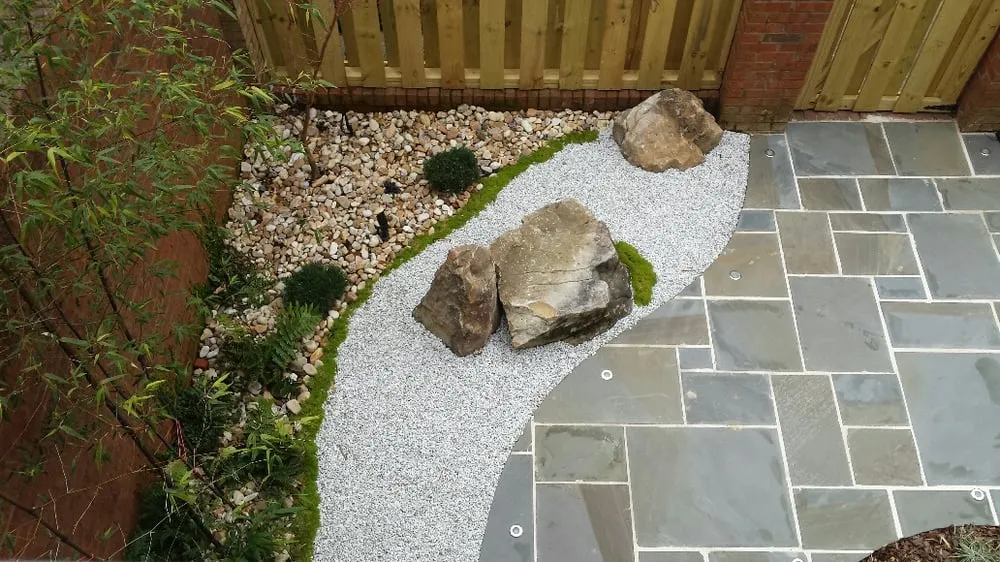 Custom yard cleanup service with custom design in Scottdale, GA by Plants Creative Landscapes