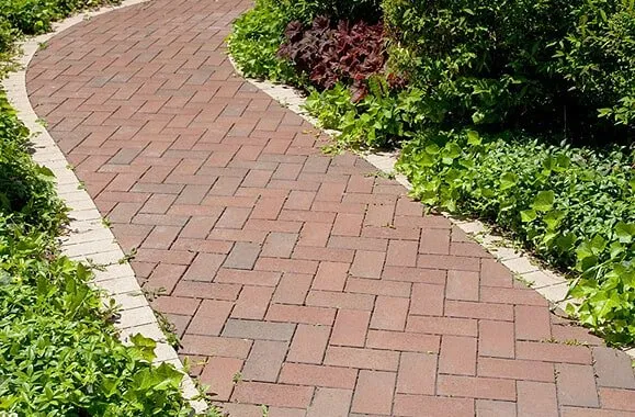 Reliable lawn care service for residential properties in Birmingham, MI by Platinum Hardscapes