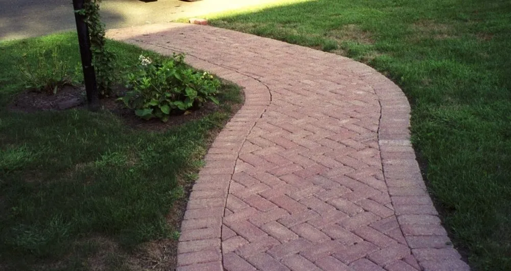 Professional lawn mowing service in Birmingham, MI by Platinum Hardscapes