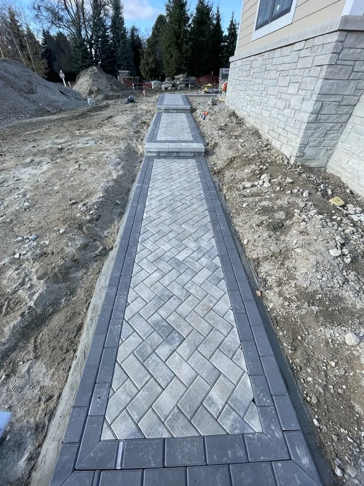 Trusted lawn mowing service for year-round maintenance in Birmingham, MI by Platinum Hardscapes