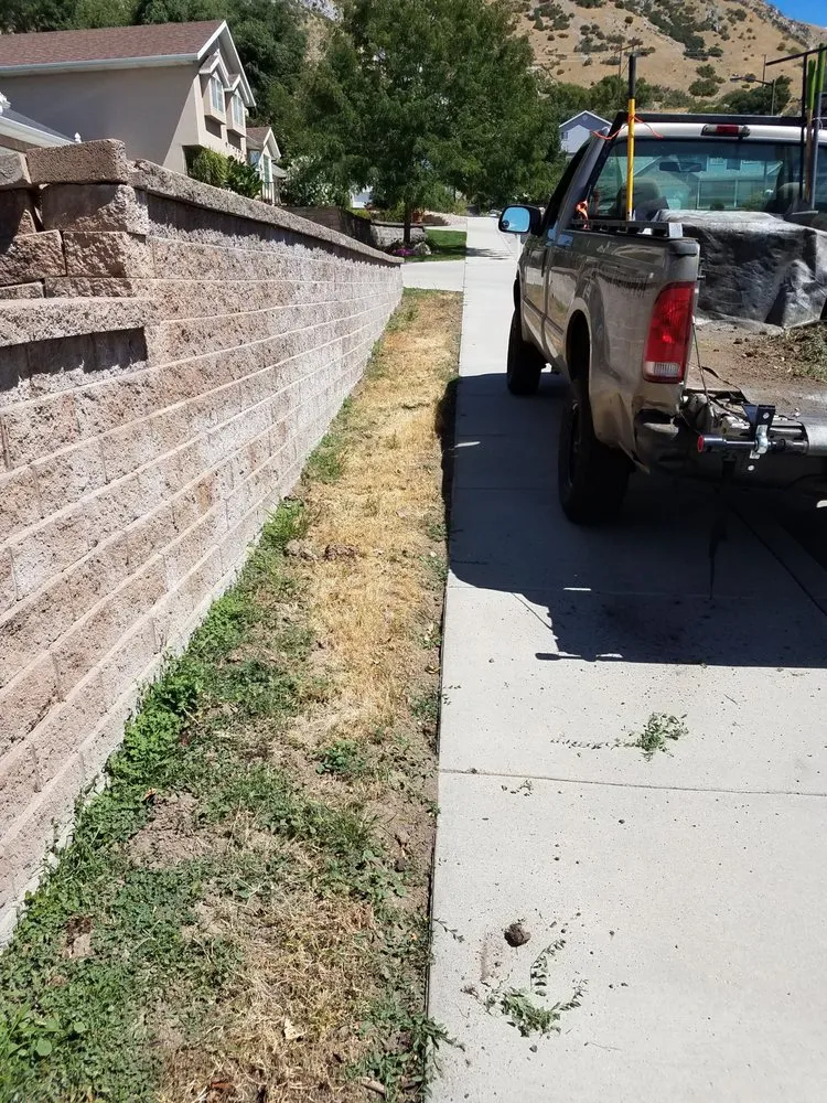 Professional lawn care service for year-round maintenance in Spanish Fork, UT by Platinum Lawn Service