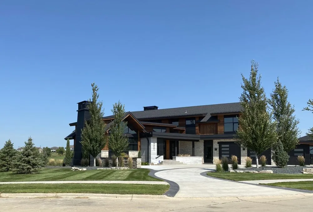 Custom lawn care service for year-round maintenance in Sioux City, IA by Platinum LawnScapes