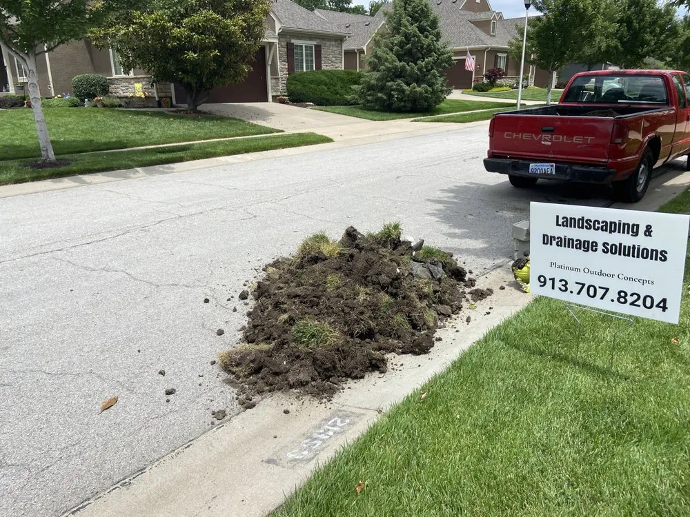 Professional yard maintenance for homes in Lenexa, KS by Platinum Outdoor Concepts