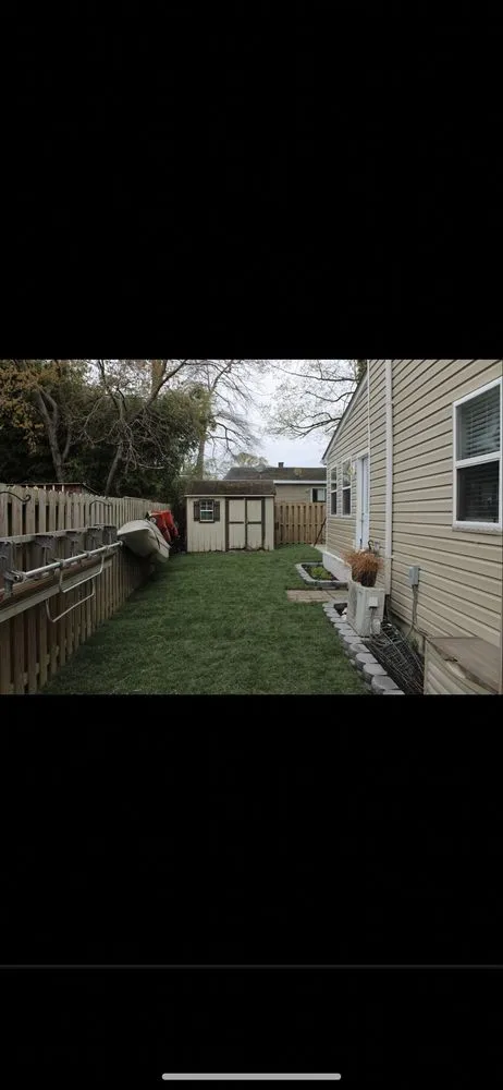 Reliable lawn care service for residential properties in Baltimore, MD by Platinum Pavers and Landscaping