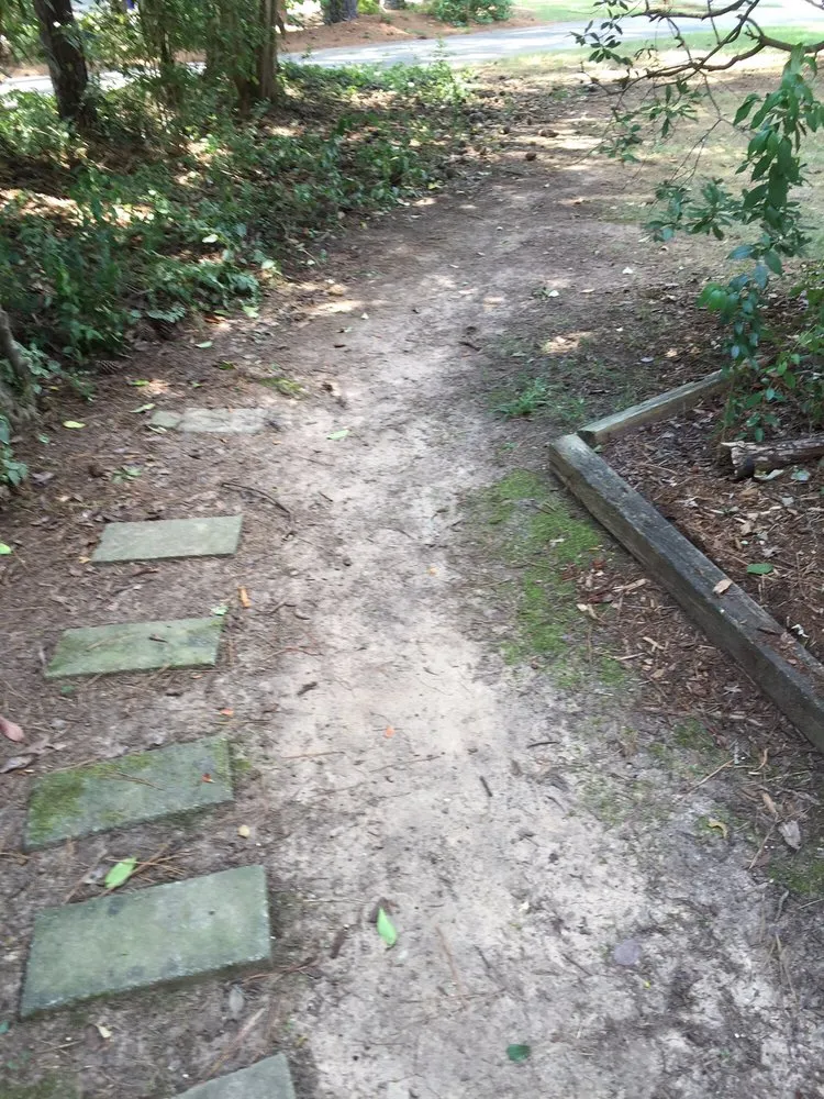 Professional yard maintenance for beautiful yards in Durham, NC by Pleasant Green Grass