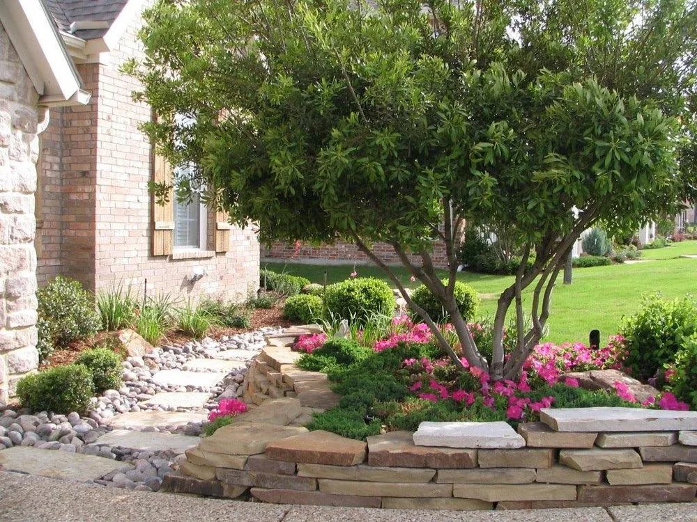 Custom outdoor landscaping in Carrollton, TX by PLM Landscaping and Outdoor Living