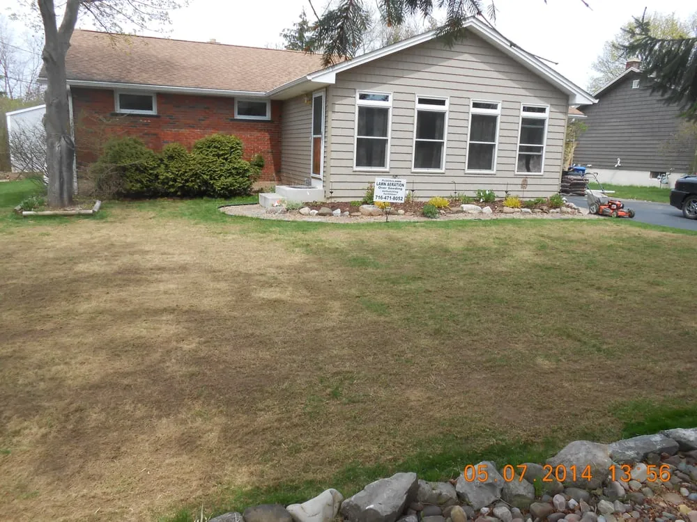 Custom landscape design in Youngstown, NY by Plugnalawn Lawn Aeration