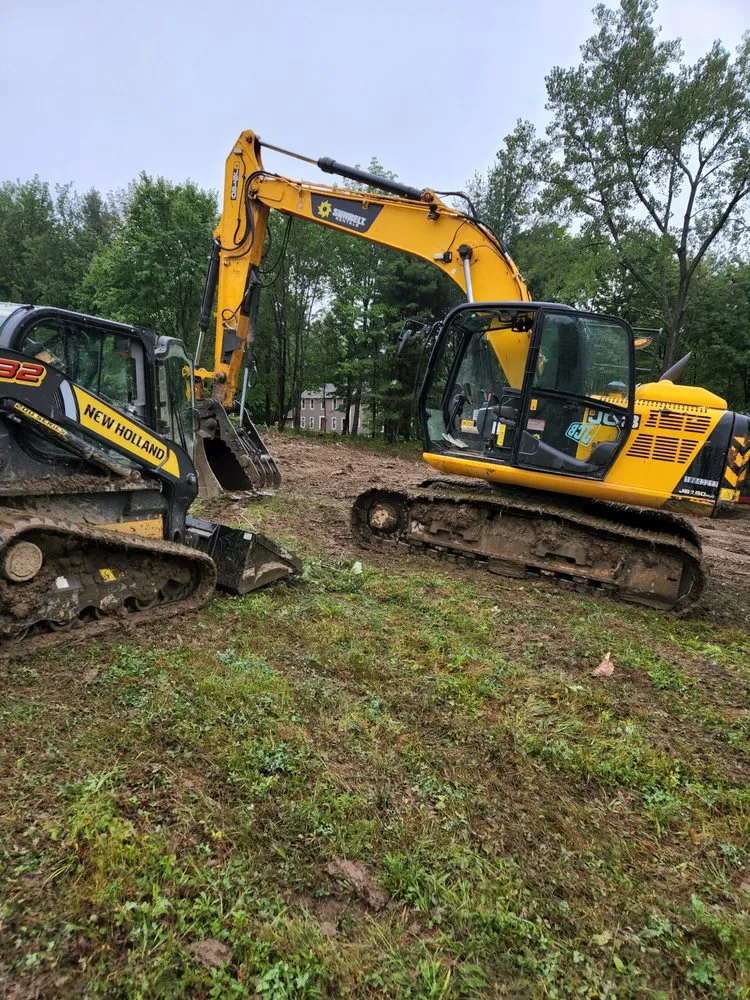 Local landscape design with custom design in Russell, MA by Plumley Landscaping