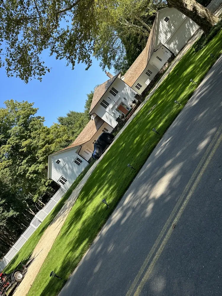 Local lawn mowing service for residential properties across Locust Valley, NY - PMC landscaping