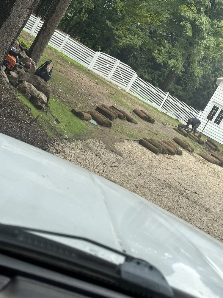 Local lawn care service for residential properties in Locust Valley, NY by PMC landscaping