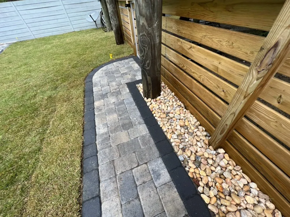 Professional yard maintenance with custom design in Santa Rosa Beach, FL by Poarch Creek Landscaping