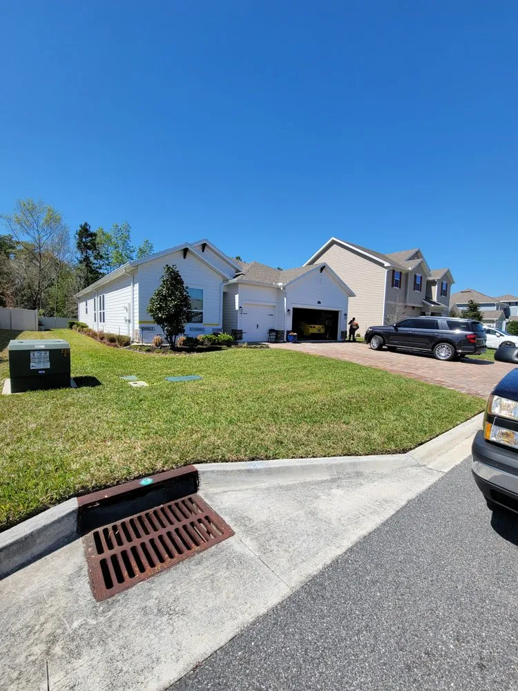 Professional yard maintenance in Orange Park, FL by Pollicks Lawncare