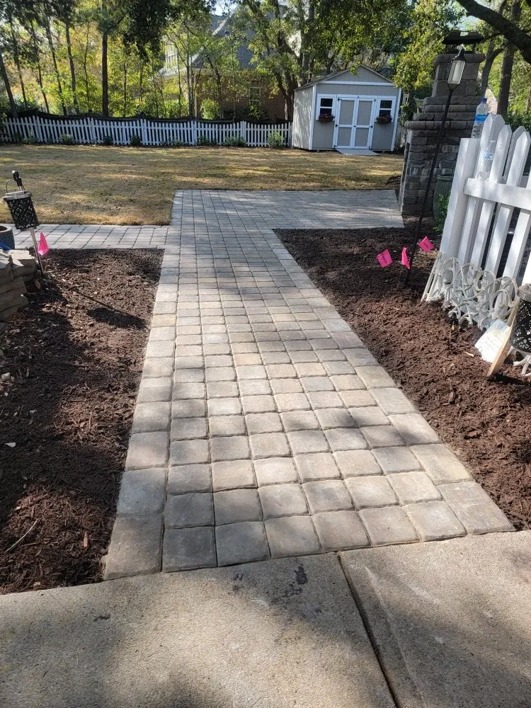 Affordable lawn mowing service in Wilmington, NC by Poly Landscapes