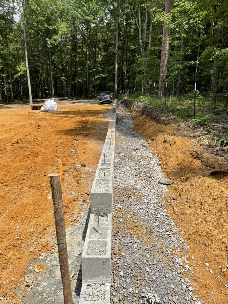 Custom landscape installation for outdoor upgrades in Jasper, AL by Polygon Construction