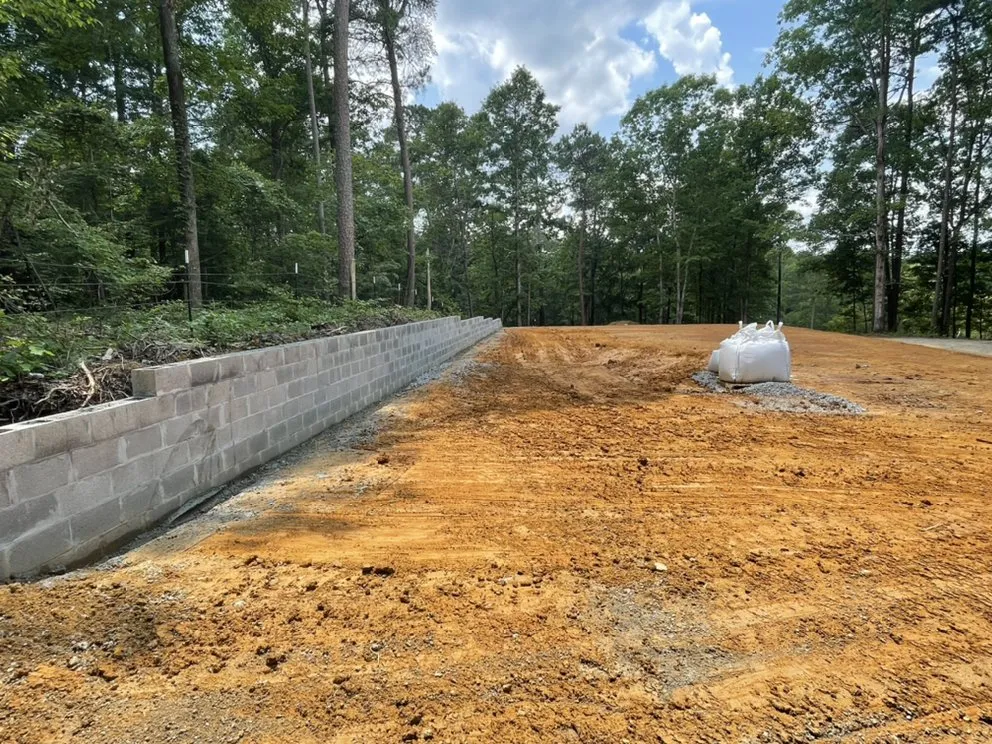 Expert lawn mowing service for outdoor upgrades in Jasper, AL by Polygon Construction