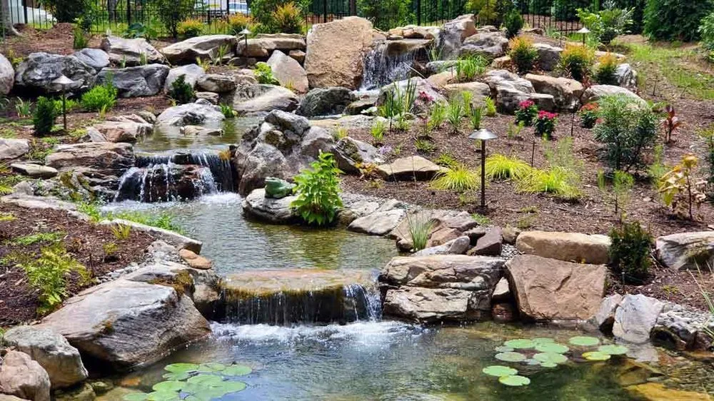 Custom outdoor landscaping for beautiful yards across Mooresville, NC - Pond Country