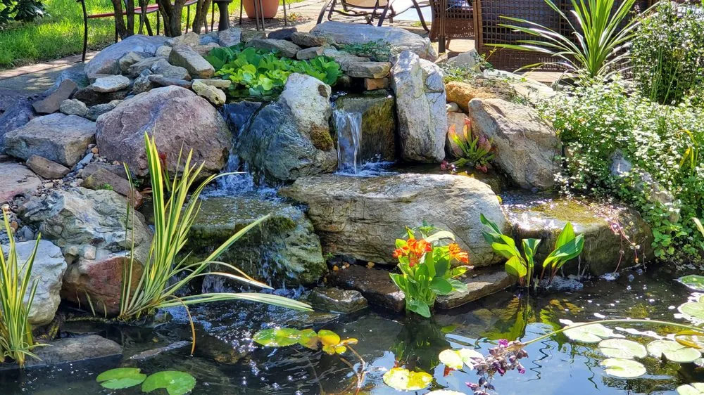 Professional landscape installation for homes in Mooresville, NC by Pond Country