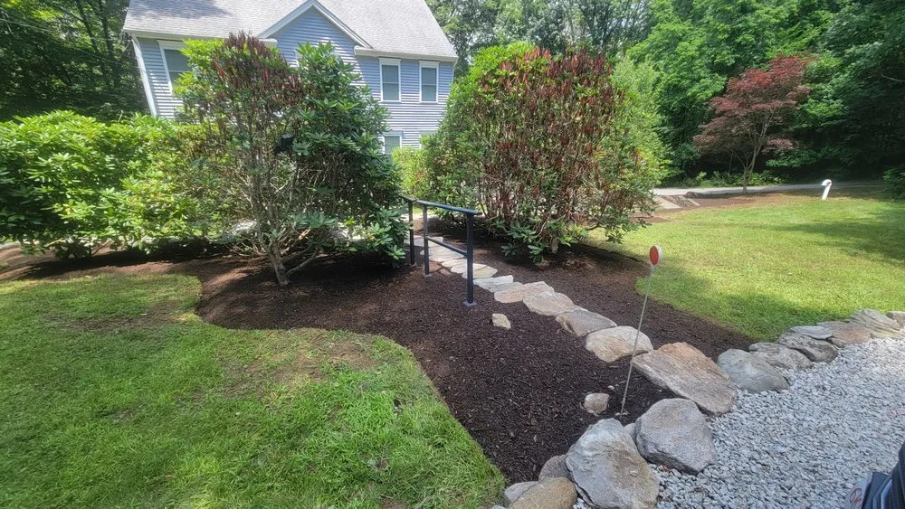 Affordable lawn mowing service in Bellingham, MA by Pond Hollow Landscape & Design