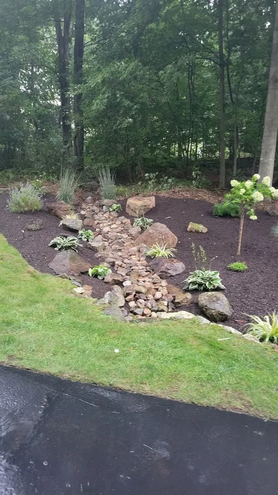 Professional yard cleanup service in Bellingham, MA - Pond Hollow Landscape & Design