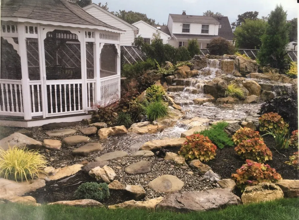 Expert garden landscaping for outdoor upgrades across Islandia, NY - Pond Paradise Designs