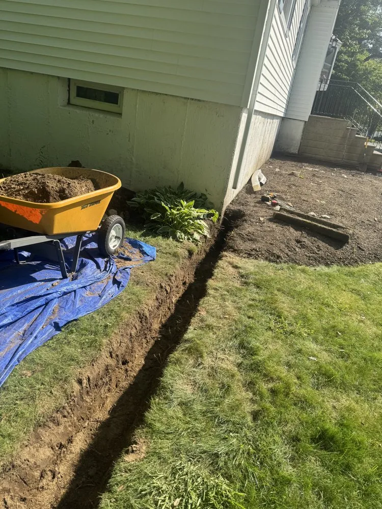 Local lawn care service with custom design in Foxborough, MA by Pond Property Maintenance