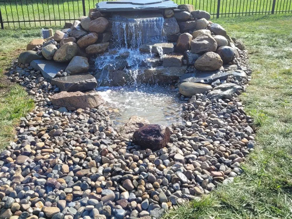 Professional yard maintenance in North Canton, OH by Pond Wiser