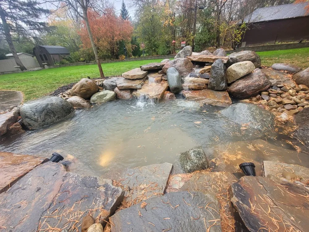 Affordable landscaping services for residential properties in North Canton, OH by Pond Wiser