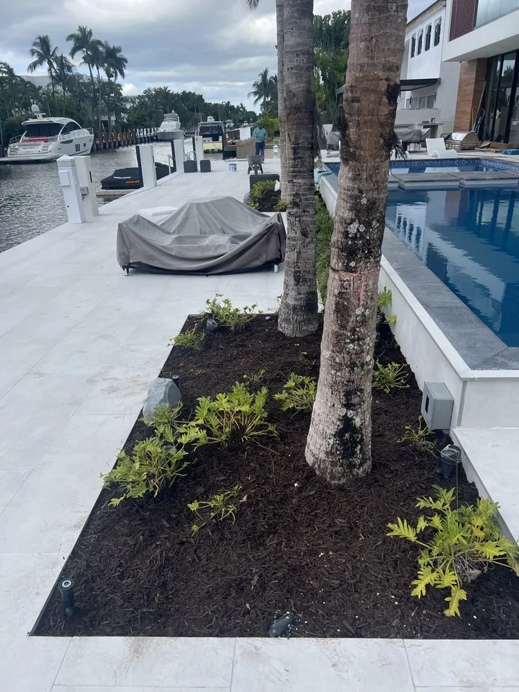 Professional lawn mowing service for year-round maintenance in Oakland Park, FL by Ponderosa Landscaping