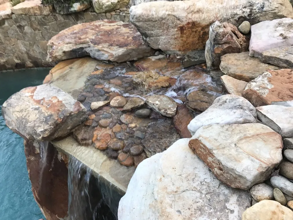 Reliable landscaping services with custom design in Harrisburg, NC by Ponders