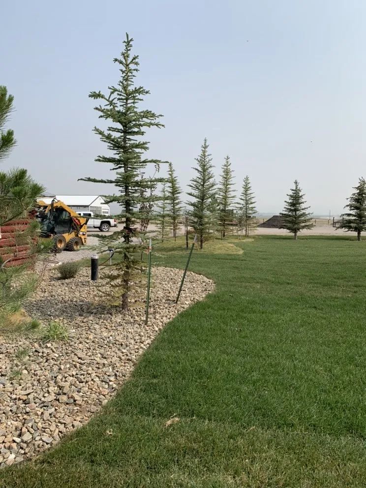 Custom landscape design in Rigby, ID by Pondside Property Services