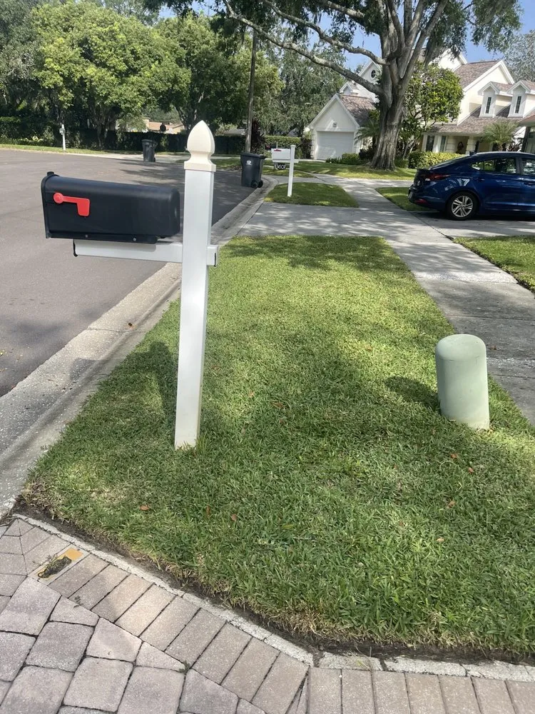 Reliable lawn mowing service for homes in Tampa, FL by Pooh's Lawncare