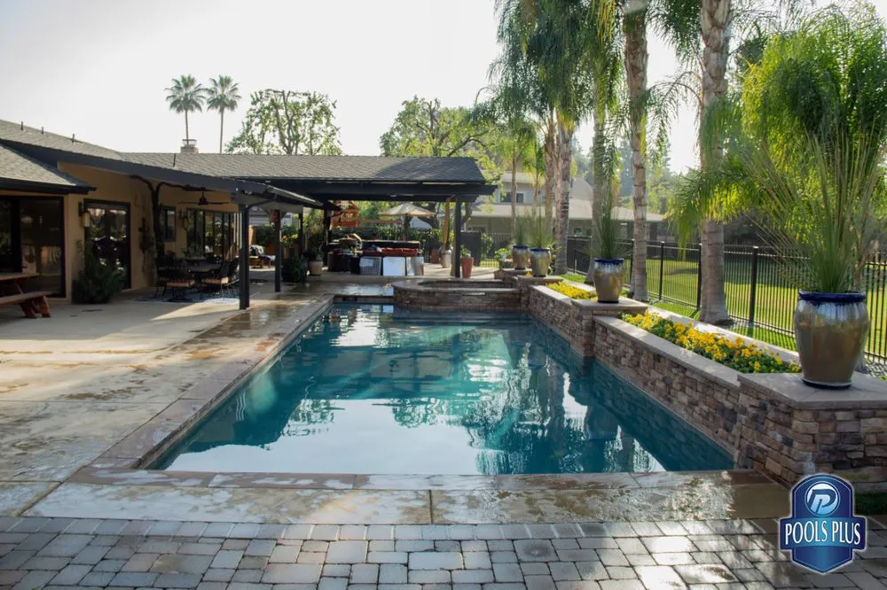 Custom lawn care service with custom design across Visalia, CA - Pools Plus