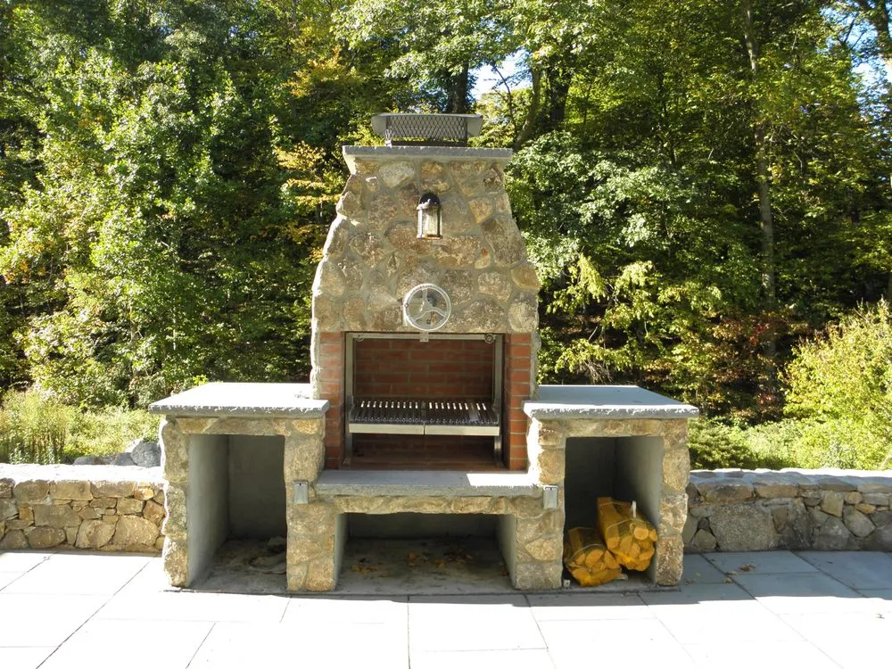 Professional lawn mowing service with custom design in Woodbridge, CT by POPEL Landscaping and Design