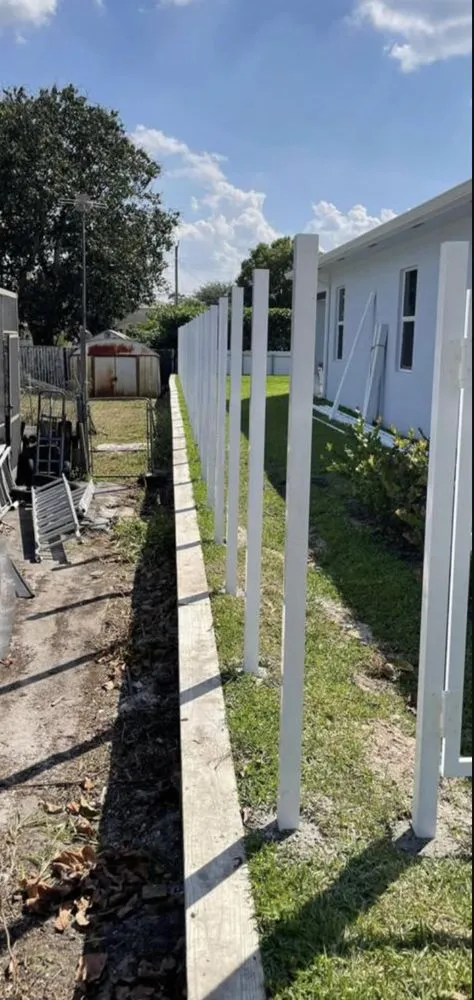 Local lawn care service for year-round maintenance in Lake Worth, FL by POPS Landscaping