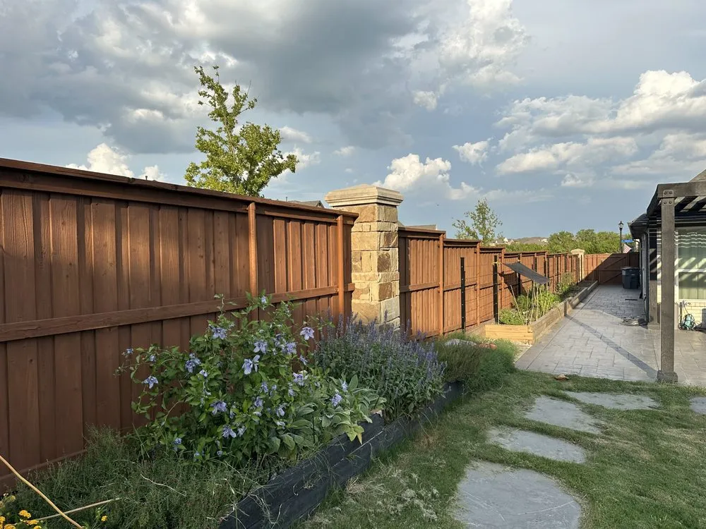 Professional yard maintenance for residential properties in Garland, TX by Porch Fencing and Landscaping