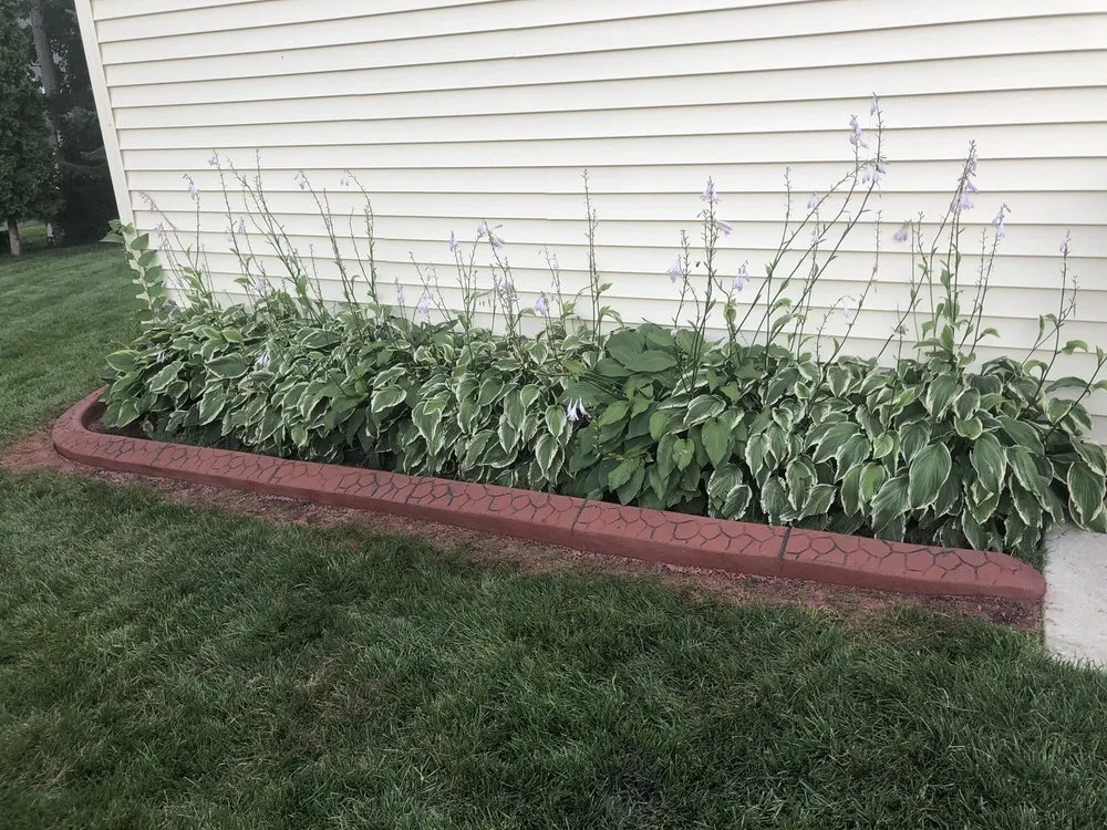 Custom landscaping services for year-round maintenance across Menomonee Falls, WI - Porter's Borders