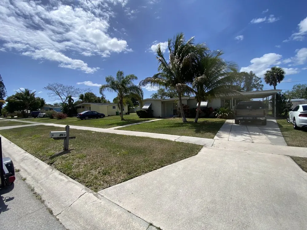 Professional landscape installation for homes across Port St. Lucie, FL - Portes & Sons