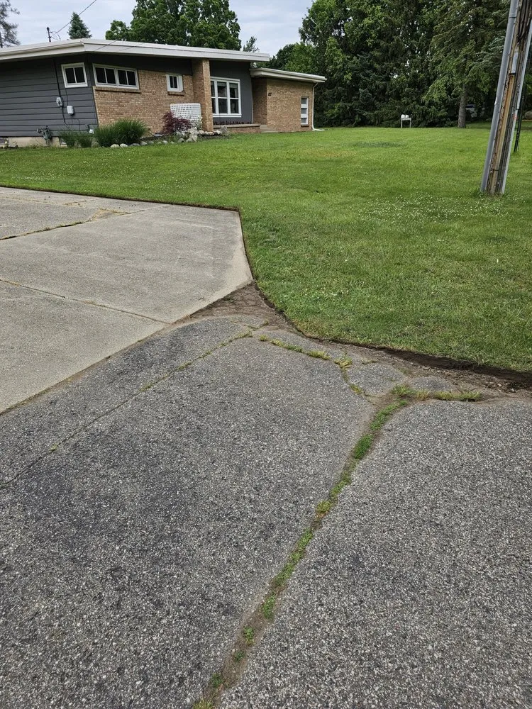 Custom lawn mowing service for year-round maintenance in Coopersville, MI by Post Property Solutions