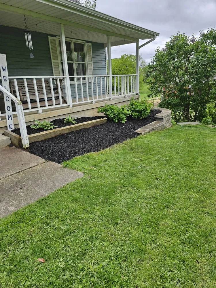 Custom landscape design with custom design in Coopersville, MI by Post Property Solutions