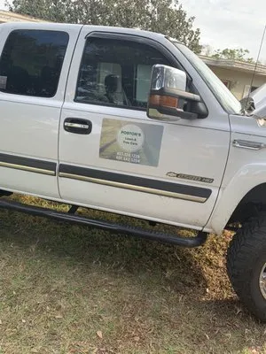 Poston’s Lawn And Tree Care Logo