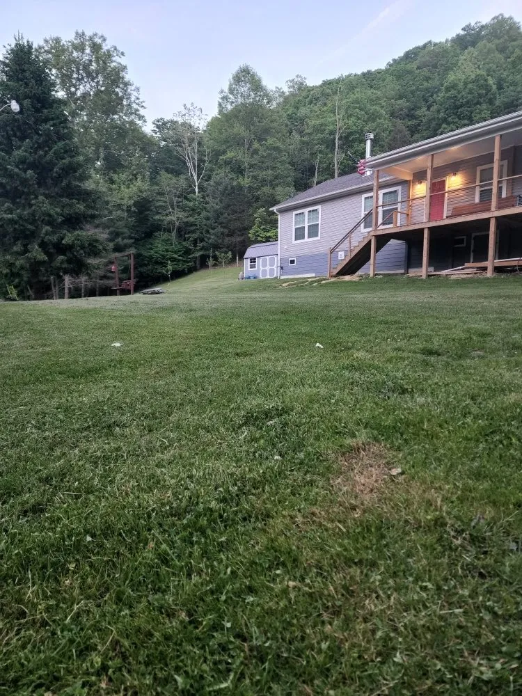 Custom landscape installation in Austinville, VA by Postons Mowing and More